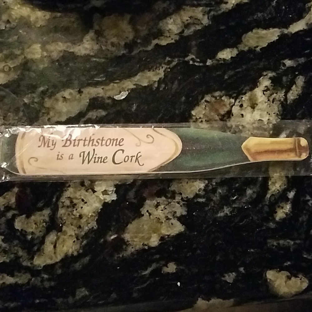 Ganz my birthstone is a wine cork Emery board